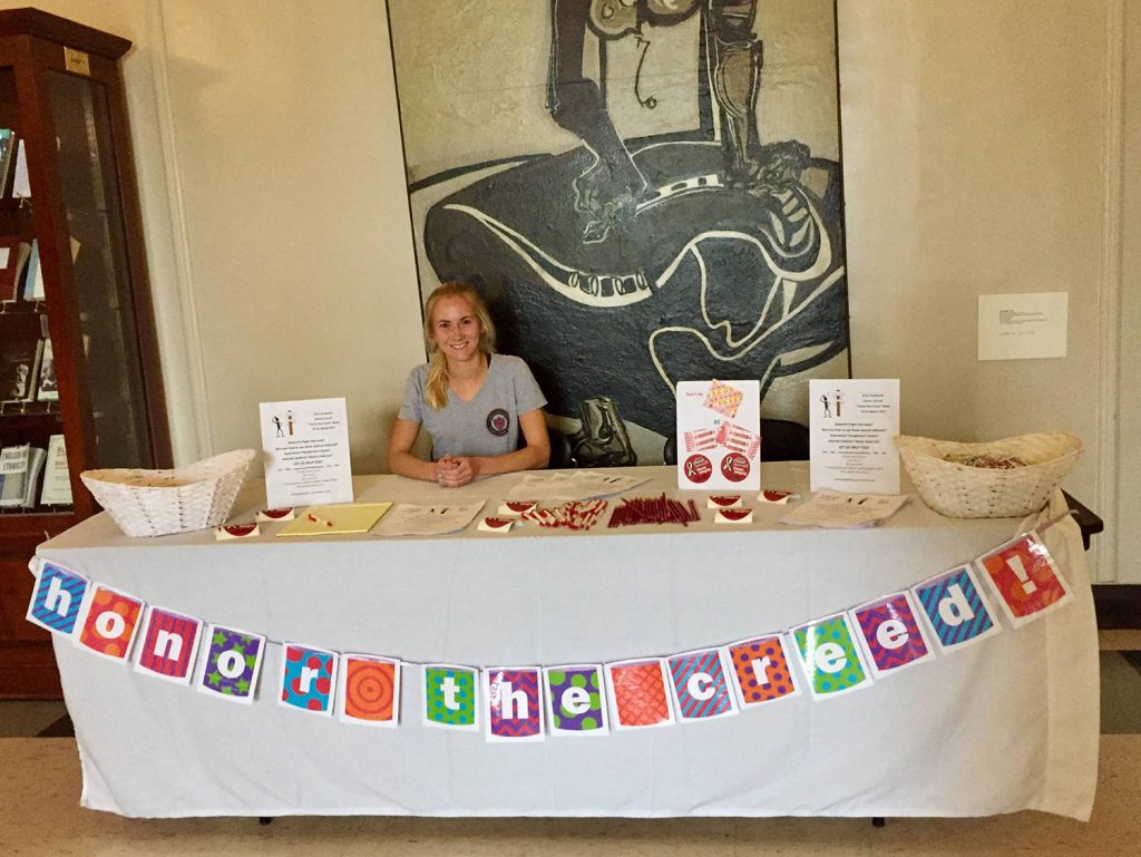 Clare Ols staffs the A&S AHC table in Morgan Hall
